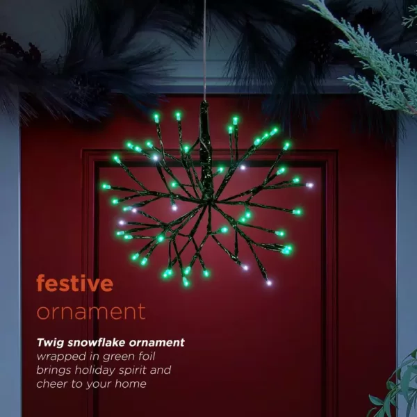 Alpine Corporation 10 in. Tall Christmas Twig Snowflake Ornament with LED Lights, Green