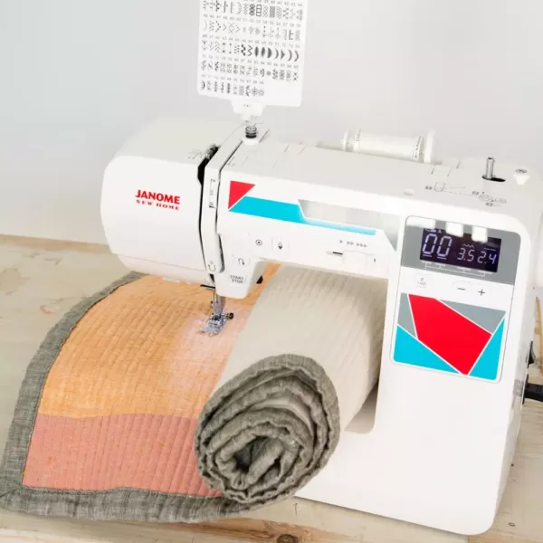 Janome MOD-100Q Quilting and Sewing Machine with Bonus Quilting Accessories
